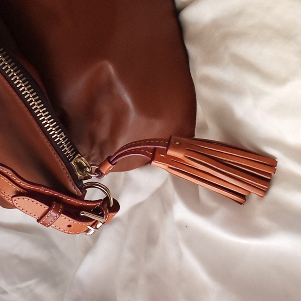 Dooney & Bourke Smooth Genuine Leather    Handbag. Color is a  Rich Caramel. - Picture 10 of 16